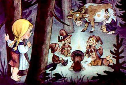 вокруг костра гномы сидят, женщина доит её корову, а маленькие человечки пьют молоко