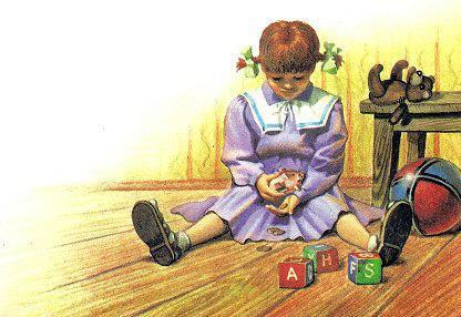 девочка играет с кубиками