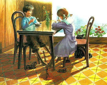 мальчик и девочка за столом едят
