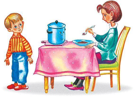 мама кормит сына кашей на кухне