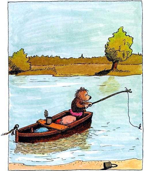 медвежонок ловит рыбу с лодки