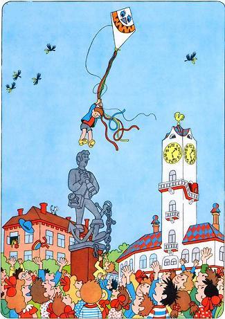мальчик на воздушном змее  парит над площадью города