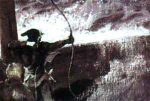 Робин Гуд стреляет из лука