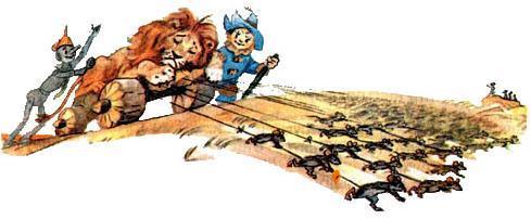 трашила и Железный дровосек вывозят на мышах льва с макового поля