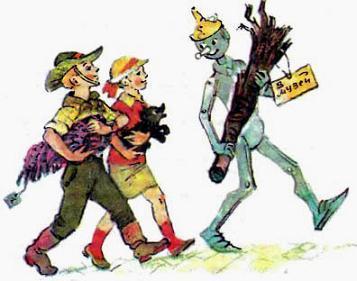 Железный дровосек несет отатки палицы в музей рядом шагают Тим и Энни